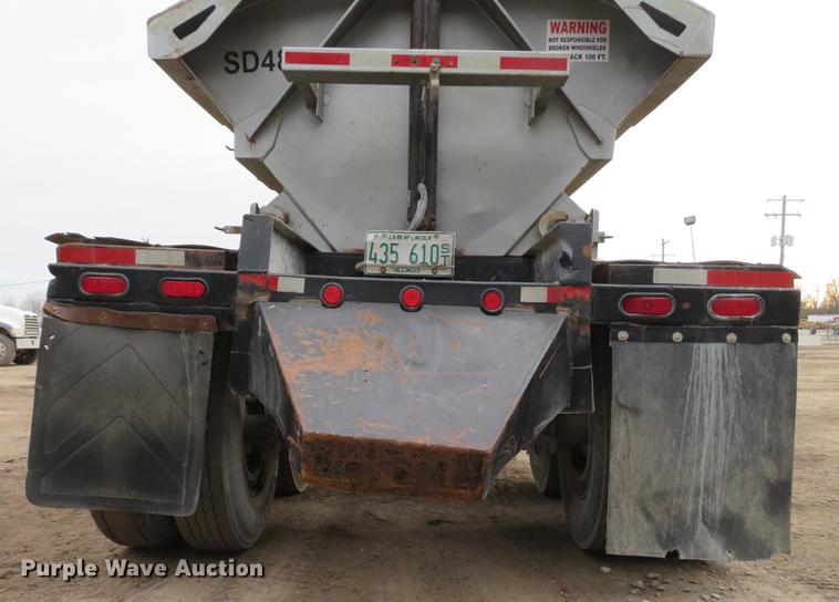 image for item DE5031 1999 Smithco side dump trailer