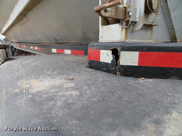 image for item DE5031 1999 Smithco side dump trailer