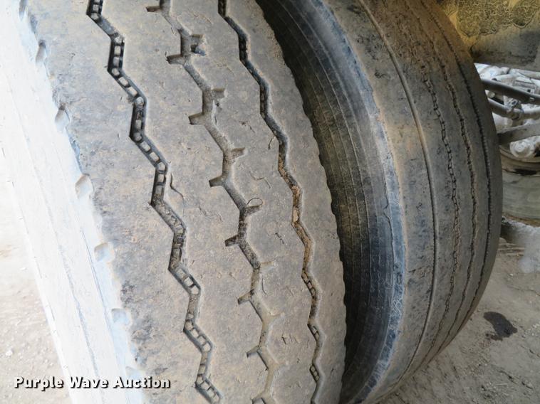 image for item DE5031 1999 Smithco side dump trailer