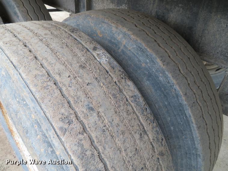 image for item DE5031 1999 Smithco side dump trailer