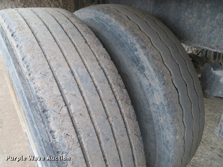 image for item DE5031 1999 Smithco side dump trailer