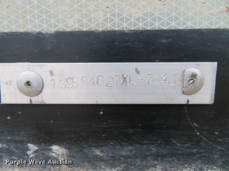 image for item DE5031 1999 Smithco side dump trailer