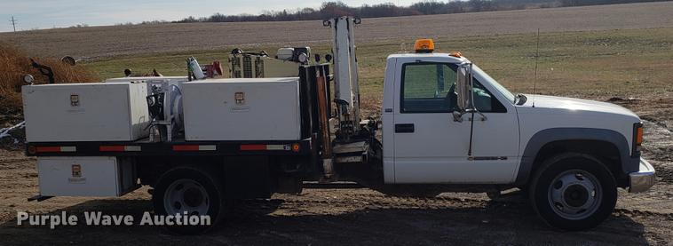 image for item AV9428 1997 Chevrolet 3500 flatbed pickup truck with crane