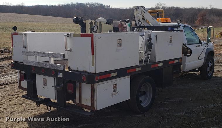 image for item AV9428 1997 Chevrolet 3500 flatbed pickup truck with crane