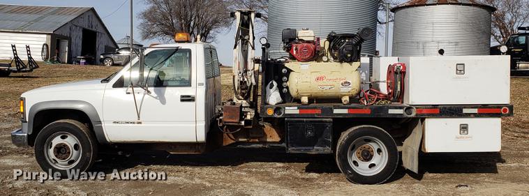 image for item AV9428 1997 Chevrolet 3500 flatbed pickup truck with crane