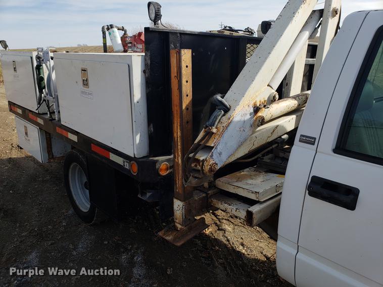 image for item AV9428 1997 Chevrolet 3500 flatbed pickup truck with crane