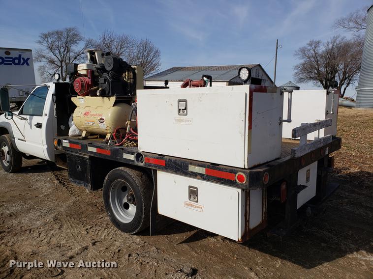 image for item AV9428 1997 Chevrolet 3500 flatbed pickup truck with crane