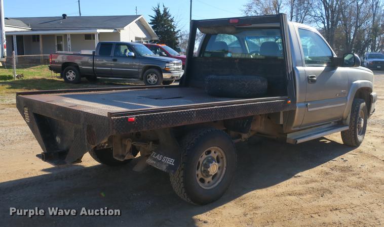 image for item DB8946 2003 Chevrolet Silverado 2500HD flatbed pickup truck