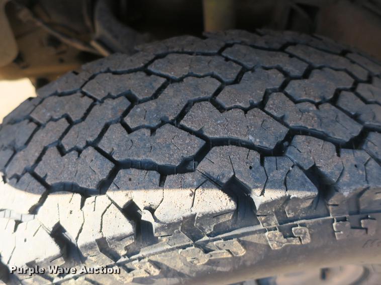 image for item DB8946 2003 Chevrolet Silverado 2500HD flatbed pickup truck