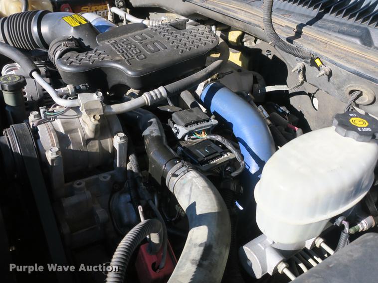 image for item DB8946 2003 Chevrolet Silverado 2500HD flatbed pickup truck