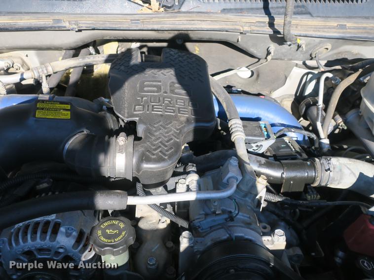 image for item DB8946 2003 Chevrolet Silverado 2500HD flatbed pickup truck