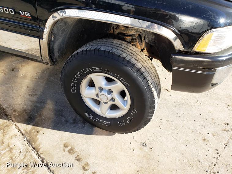 image for item DB9461 1999 Dodge Ram 1500 Quad Cab pickup truck