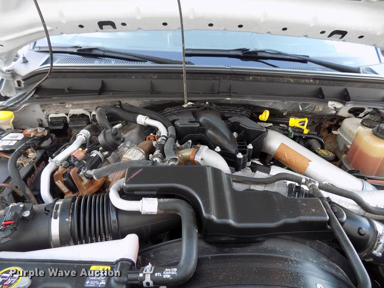 image for item DD3531 2011 Ford F450 Super Duty Crew Cab flatbed truck