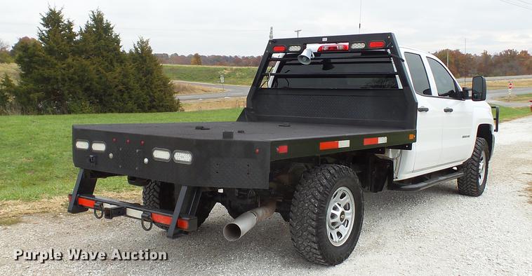 image for item DE4968 2015 Chevrolet Silverado 3500HD Double Cab flatbed pickup truck