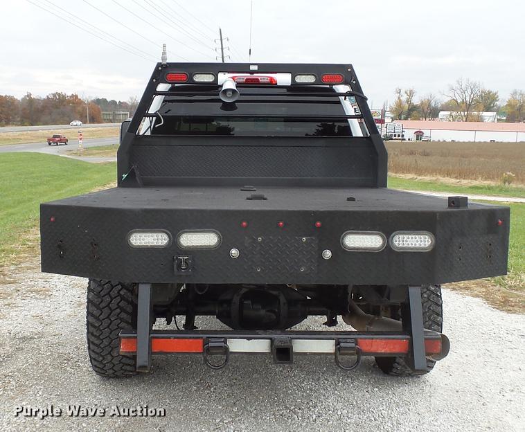image for item DE4968 2015 Chevrolet Silverado 3500HD Double Cab flatbed pickup truck