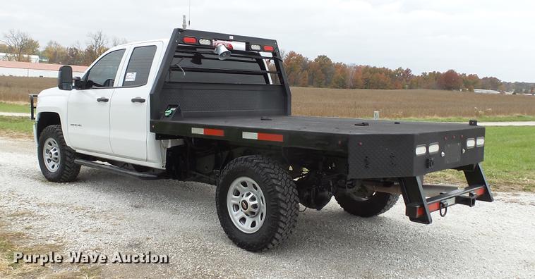 image for item DE4968 2015 Chevrolet Silverado 3500HD Double Cab flatbed pickup truck