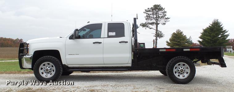 image for item DE4968 2015 Chevrolet Silverado 3500HD Double Cab flatbed pickup truck
