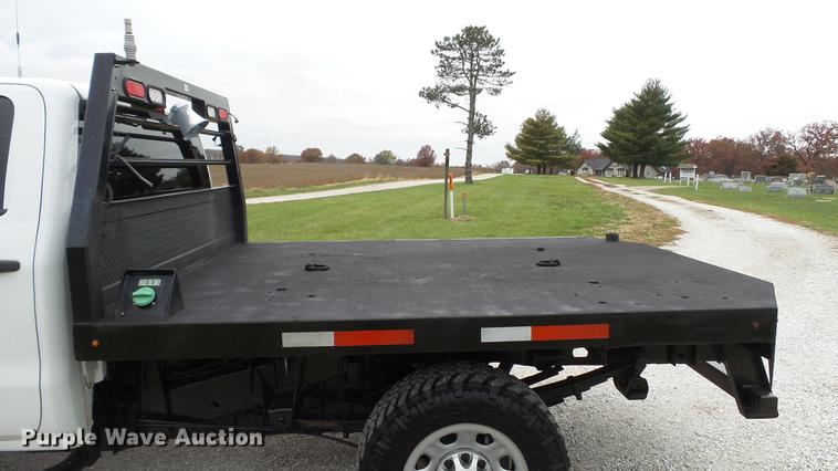 image for item DE4968 2015 Chevrolet Silverado 3500HD Double Cab flatbed pickup truck