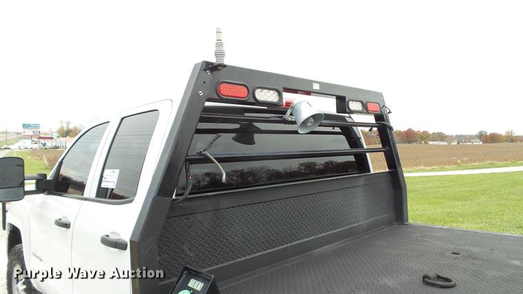 image for item DE4968 2015 Chevrolet Silverado 3500HD Double Cab flatbed pickup truck