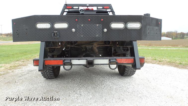 image for item DE4968 2015 Chevrolet Silverado 3500HD Double Cab flatbed pickup truck