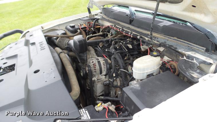 image for item DE4971 2011 Chevrolet Silverado 2500HD flatbed pickup truck