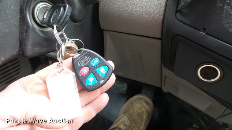 image for item DE4999 2008 Ford F450 Super Duty XL Crew Cab flatbed truck