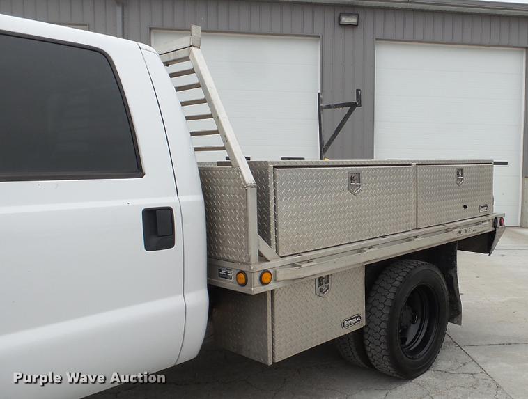 image for item DE4999 2008 Ford F450 Super Duty XL Crew Cab flatbed truck