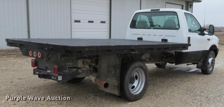 image for item DE5056 1999 Ford F450 Super Duty flatbed truck