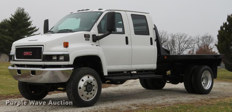 image for item DE5067 2005 GMC C5500 Crew Cab flatbed truck