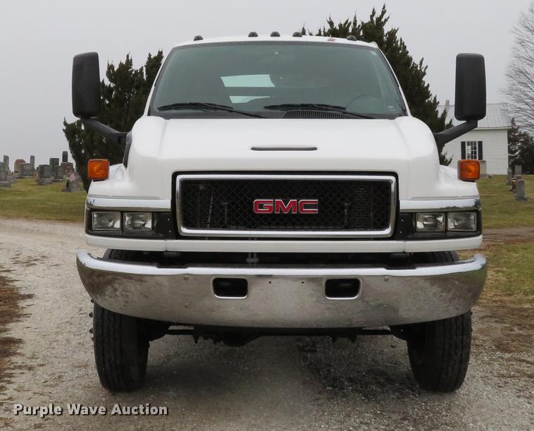 image for item DE5067 2005 GMC C5500 Crew Cab flatbed truck