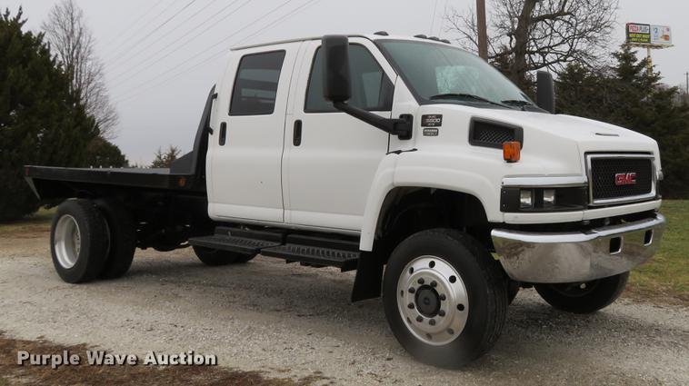 image for item DE5067 2005 GMC C5500 Crew Cab flatbed truck