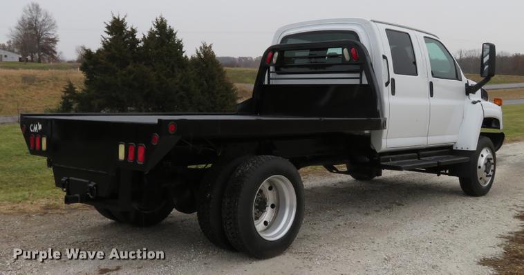 image for item DE5067 2005 GMC C5500 Crew Cab flatbed truck