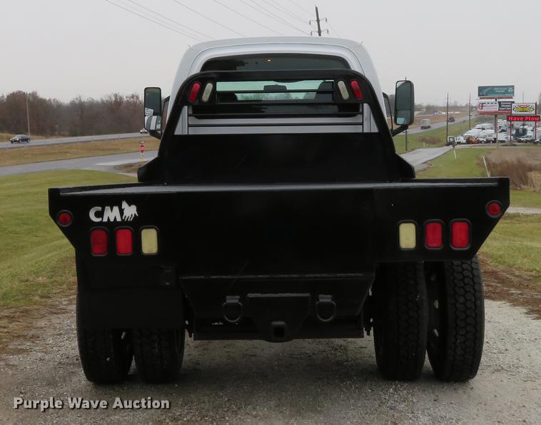 image for item DE5067 2005 GMC C5500 Crew Cab flatbed truck