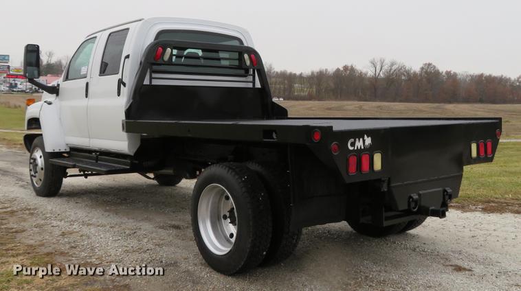 image for item DE5067 2005 GMC C5500 Crew Cab flatbed truck