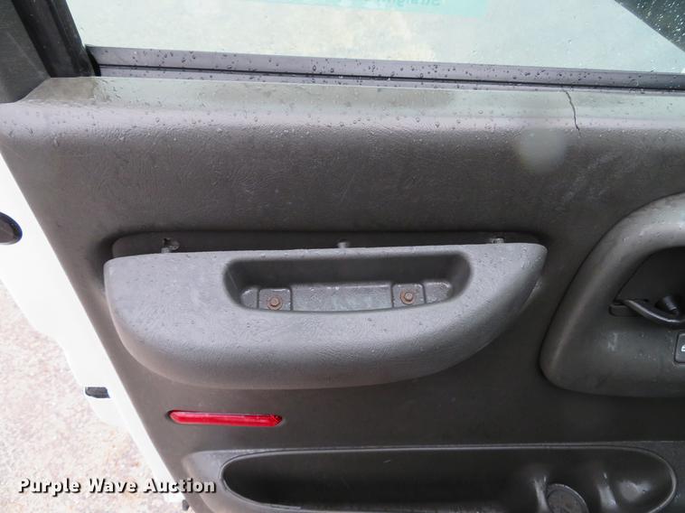 image for item DE5067 2005 GMC C5500 Crew Cab flatbed truck