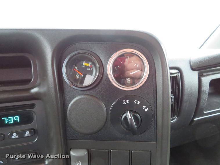 image for item DE5067 2005 GMC C5500 Crew Cab flatbed truck