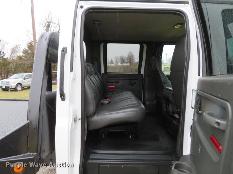 image for item DE5067 2005 GMC C5500 Crew Cab flatbed truck