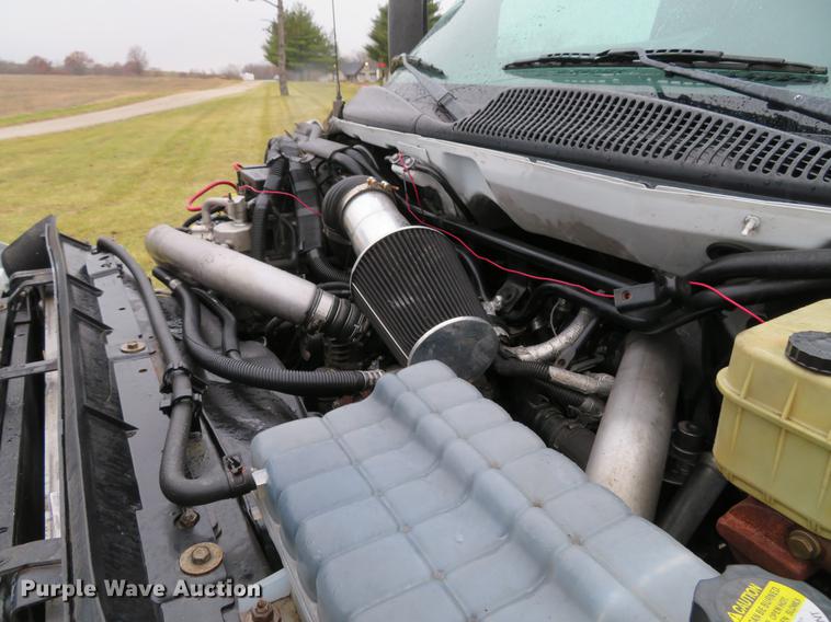 image for item DE5067 2005 GMC C5500 Crew Cab flatbed truck