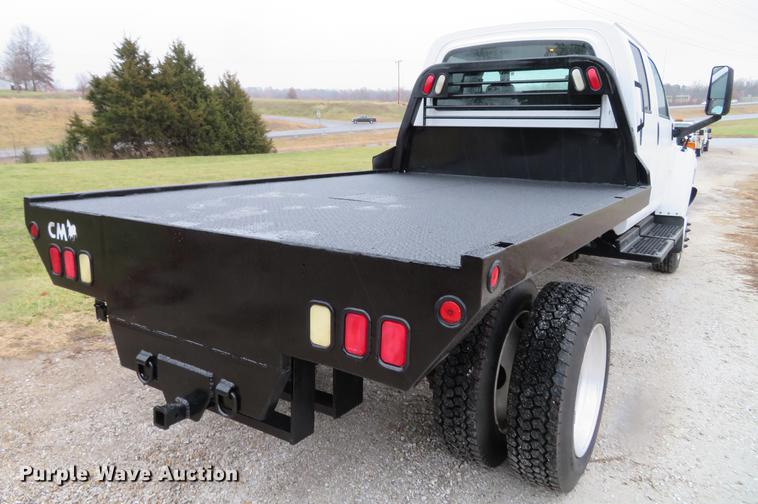 image for item DE5067 2005 GMC C5500 Crew Cab flatbed truck