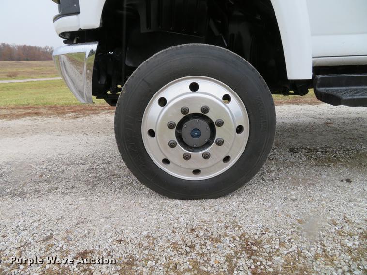 image for item DE5067 2005 GMC C5500 Crew Cab flatbed truck