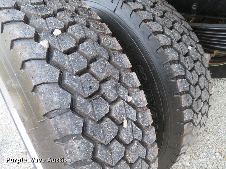 image for item DE5067 2005 GMC C5500 Crew Cab flatbed truck