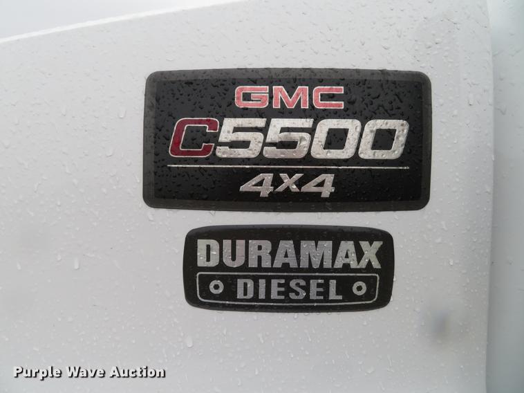 image for item DE5067 2005 GMC C5500 Crew Cab flatbed truck