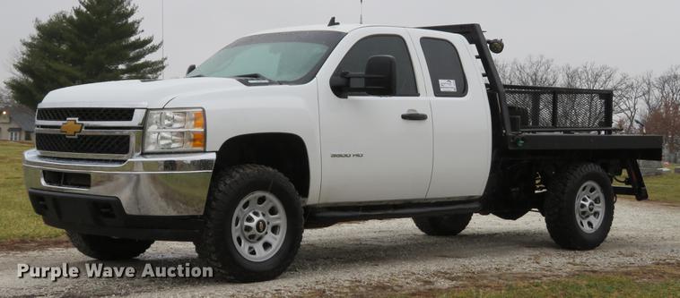 image for item DE5069 2013 Chevrolet Silverado 3500HD Ext. Cab flatbed pickup truck