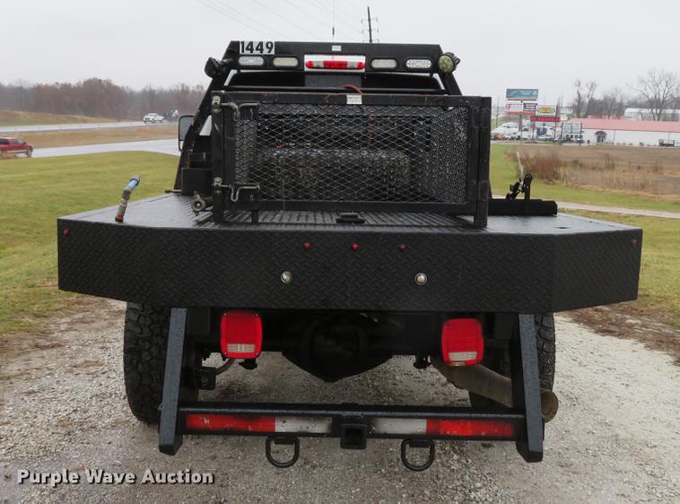 image for item DE5069 2013 Chevrolet Silverado 3500HD Ext. Cab flatbed pickup truck