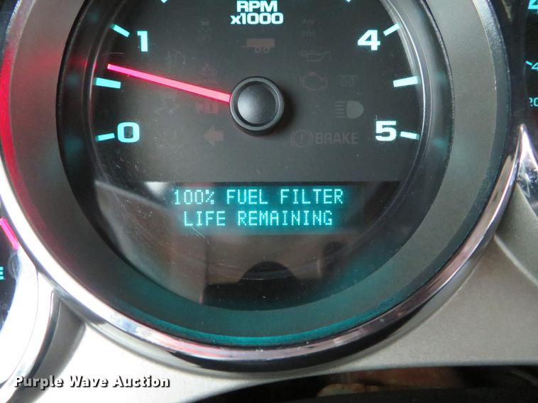 image for item DE5069 2013 Chevrolet Silverado 3500HD Ext. Cab flatbed pickup truck