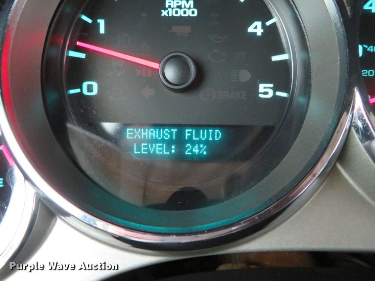 image for item DE5069 2013 Chevrolet Silverado 3500HD Ext. Cab flatbed pickup truck