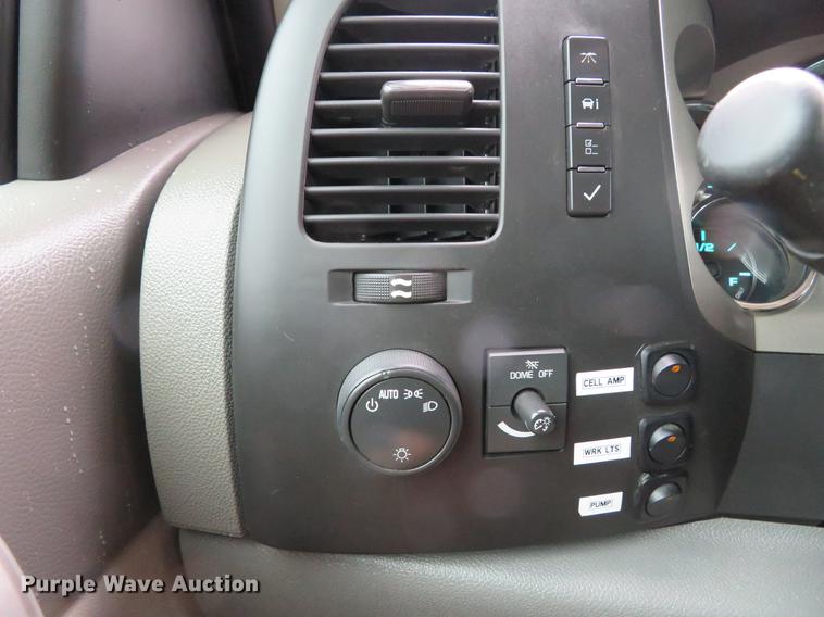 image for item DE5069 2013 Chevrolet Silverado 3500HD Ext. Cab flatbed pickup truck