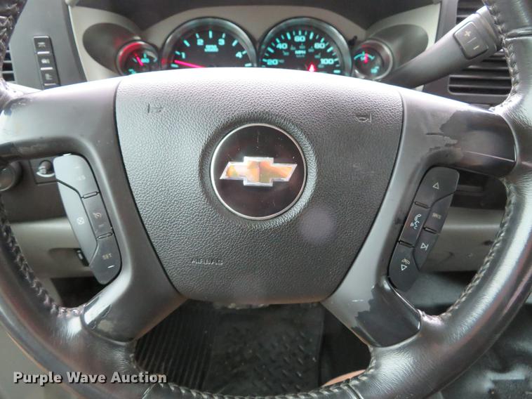 image for item DE5069 2013 Chevrolet Silverado 3500HD Ext. Cab flatbed pickup truck