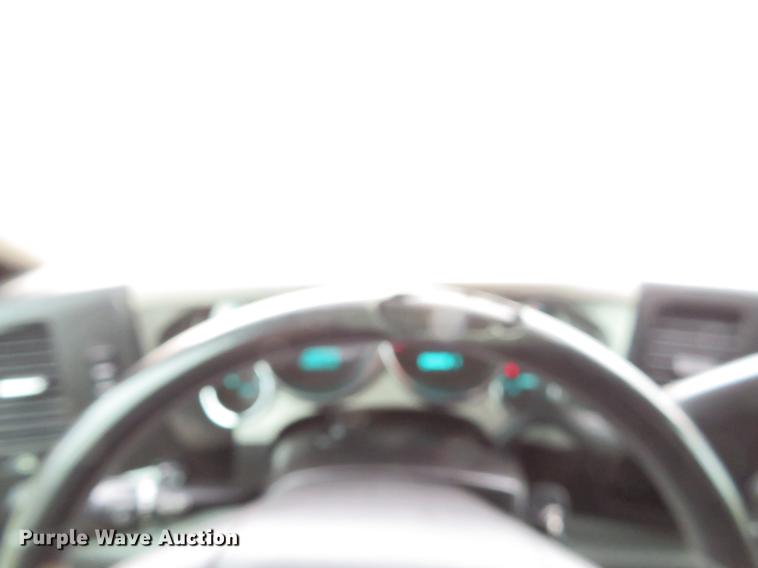 image for item DE5069 2013 Chevrolet Silverado 3500HD Ext. Cab flatbed pickup truck