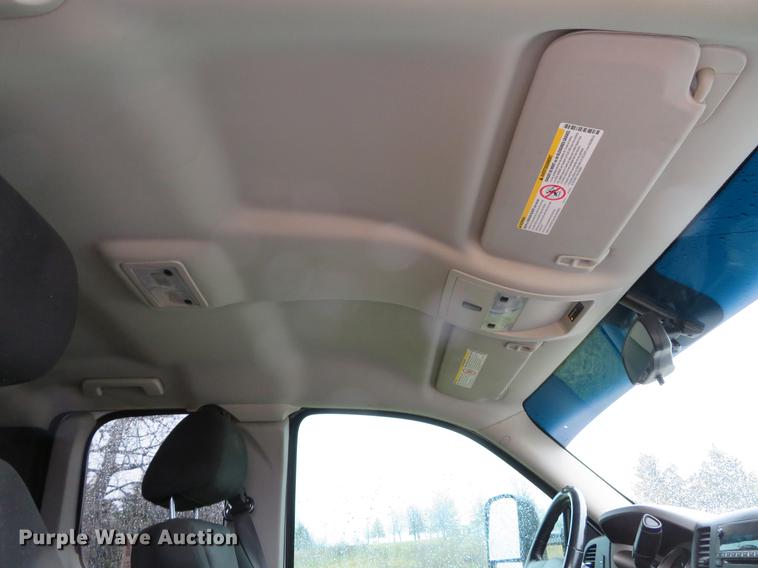 image for item DE5069 2013 Chevrolet Silverado 3500HD Ext. Cab flatbed pickup truck